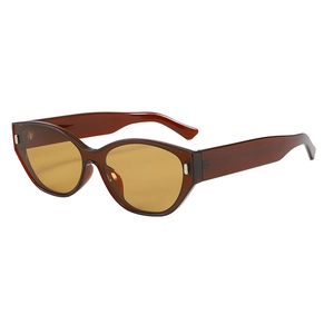 Retro cat-eye sunglasses with translucent brown frames and yellow lenses for a stylish look