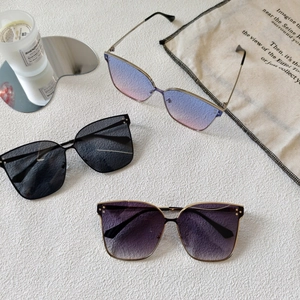 Three pairs of stylish oversized metal frame sunglasses for kids in various colors