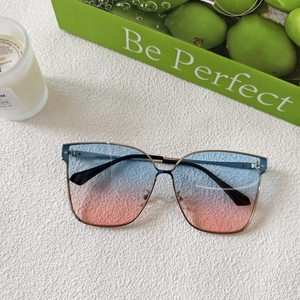 Detail of metal frame sunglasses with gradient blue pink lenses on a white texture
