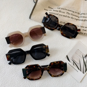 Chic oversized octagonal sunglasses with color-block frames and gradient lenses