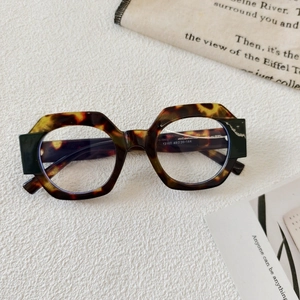 Detailed macro view of retro tortoiseshell frames with 13160 specification on inner temple