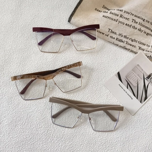 Stylish oversized half-frame anti-blue light glasses in red, tortoise, and brown colors