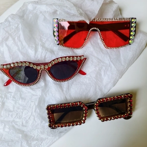 Three pairs of luxury red and black bridal sunglasses with rhinestone and pearl embellishments
