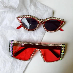 Detail of red bridal party sunglasses with luxury rhinestone and pearl embellishments
