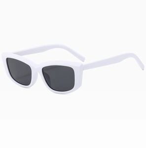 Detail showing vintage white thick-frame rectangle sunglasses with dark gray lenses