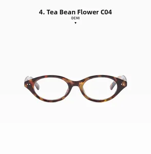 Detail view of tea tortoise cat-eye frame glasses with metallic pins and C04 demi finish
