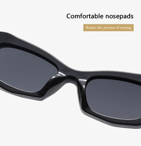 Détail des plaquettes de nez confortables sur lunettes de soleil œil-de-chat noires