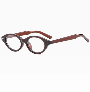 Detail view of oval tortoise glasses frame with metal rivets and model number 51020