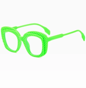 Macro shot of neon green sunglasses frame featuring a unique embossed diamond texture pattern