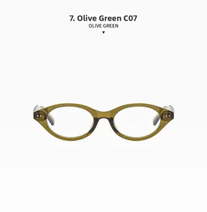 Macro view of olive green oval glasses frame with vintage silver hinge rivets