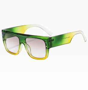 Close-up of gradient green frame sunglasses with purple lenses and stud nose bridge