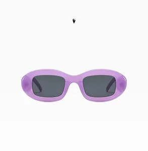 Detail view of oval purple translucent sunglasses frame with dark grey premium lenses