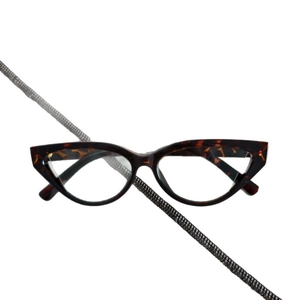 Retro tortoise shell cat eye sunglasses for women with leopard print frames on white backdrop