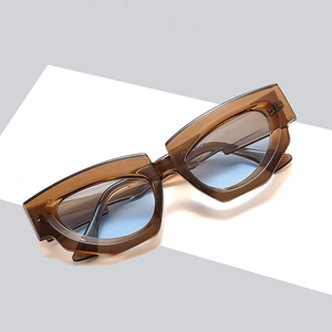 Retro square cat eye sunglasses with brown transparent frame and light blue lenses