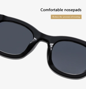 Close-up of comfortable integrated nose pads on black oval frame sunglasses