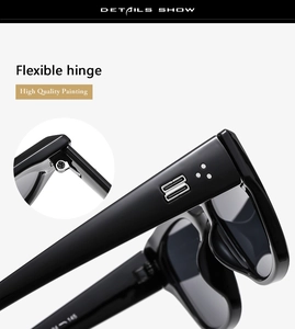 Detail view of square black sunglasses showing flexible hinges and metal logo accents
