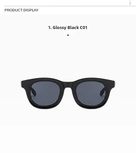Detail of glossy black wide frame sunglasses with dark grey lenses in C01 finish