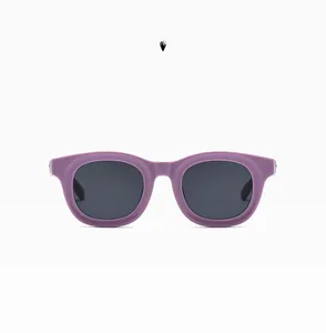 Front view of stylish purple thick D-frame sunglasses with dark grey tinted lenses
