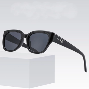Square frame sunglasses with rivet accents and metallic B logo on the black temples