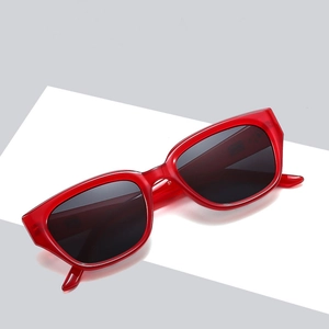 Square red transparent frame sunglasses with dark lenses for men and women