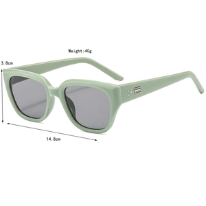 Sage green square sunglasses with silver geometric accents and dark gray lenses