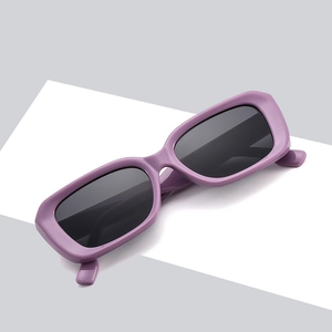 Retro purple rectangular sunglasses with black lenses shown at a 45-degree angle