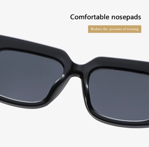 Detail of comfortable nose pads on black rectangle sunglasses to reduce wearing pressure