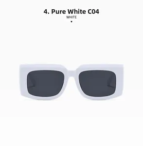 Detailed view of solid white rectangle sunglasses with wide temples and dark lenses