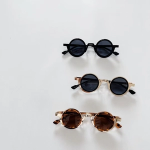 Retro steampunk round metal frame sunglasses for kids in black, gold, and tortoiseshell