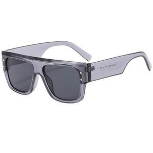 Fashionable oversized square sunglasses with transparent gray frames and dark lenses