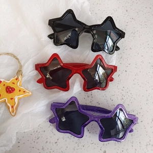 Cute star-shaped glitter sunglasses for kids in black, red, and purple with grey lenses