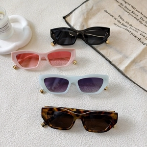 Pink cat-eye sunglasses with retro resin frames and gold metal accents for women