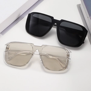 Modern oversized square sunglasses in black and transparent tea colors for outdoor fashion