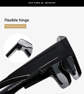 Detailed macro view showing the flexible hinge and high quality finish on black cat eye frames