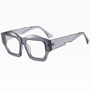 Detail view of transparent grey polygonal sunglasses frame with model ZN3823 on temple