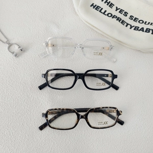 Detail of retro square kids sunglasses with UV400 protection in three trendy colors