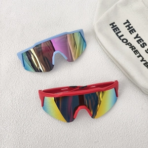 Kids sports cycling sunglasses with large colorful mirrored lenses in blue and red frames