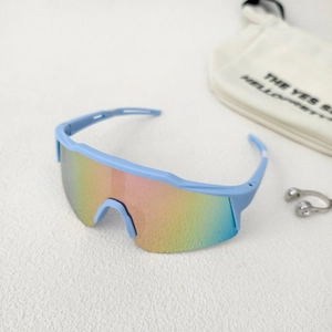 Detail of light blue kids sports sunglasses with rainbow gradient lens and storage bag