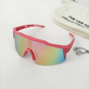 Detailed shot of kids sports sunglasses with pink matte frame and rainbow mirror lens