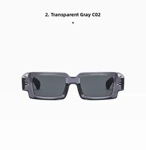 Close-up of transparent gray rectangular sunglasses with sleek gray lenses and metallic detail