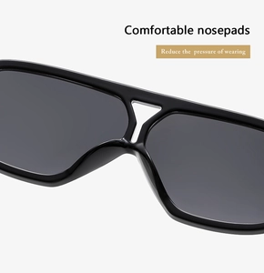 Close-up of comfortable ergonomic nose pads on vintage square double-bridge sunglasses