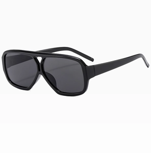 Detail of square pilot sunglasses with double bridge and glossy black resin frame