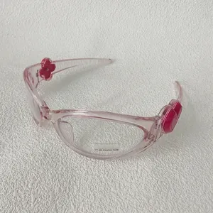 Lunettes anti-lumière bleue rose pour enfant avec détails trèfle et cœur rouges