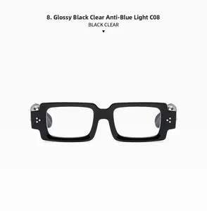 Detail of square black frame glasses with silver rivets and anti-blue light lenses