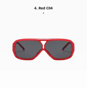 Front view detail of bright red square frame sunglasses with dark grey lenses