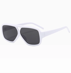 Detail view of the sleek white double-bridge frame and dark lenses of these retro sunglasses