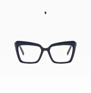 Detail of blue cat-eye glasses frame with thick temples and high-quality material finish