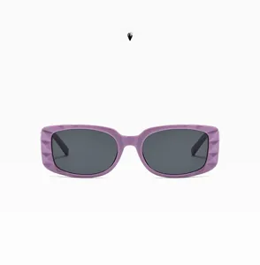 Detail of purple square sunglasses with textured checkered pattern on the frame and temple
