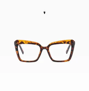 Detail of demi tortoise shell oversized cat eye eyeglass frames with vintage pattern