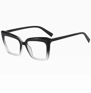 Detail of cat-eye anti-blue light glasses with black to clear gradient frame